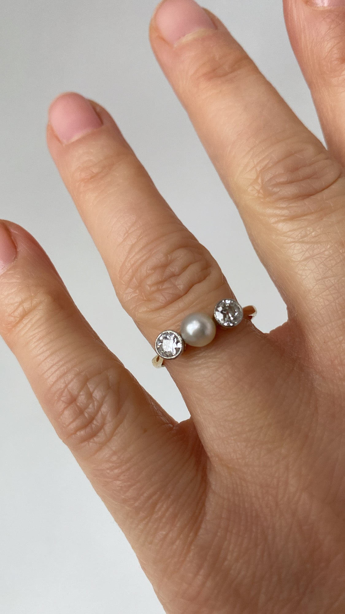 the pearl and diamond ring