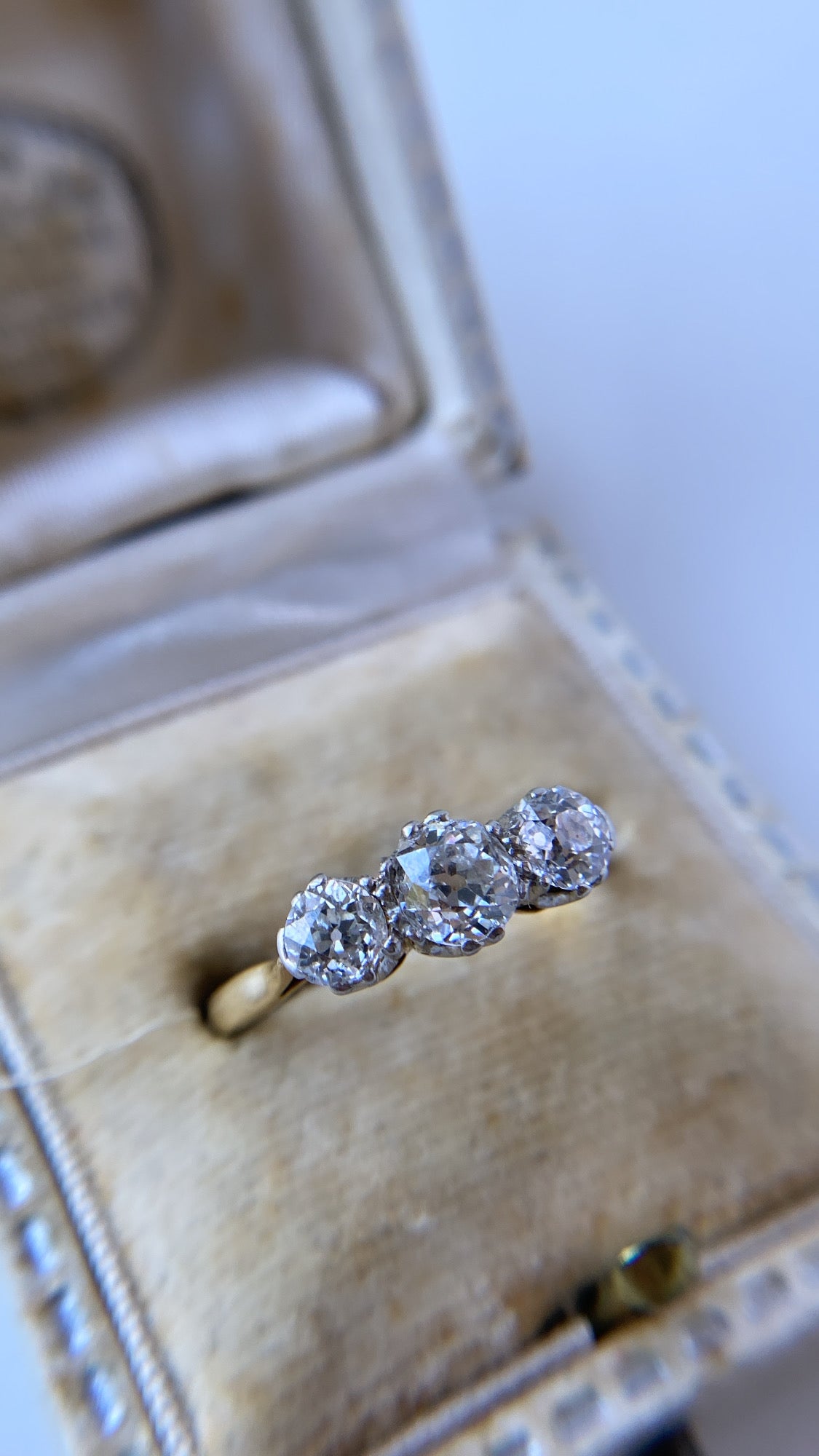 the antique diamond three stone