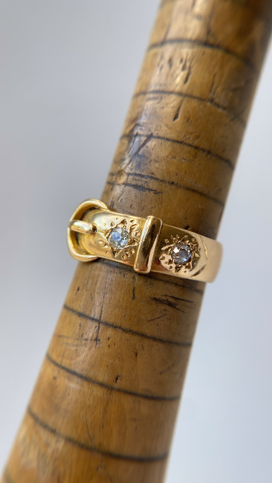 the diamond buckle ring