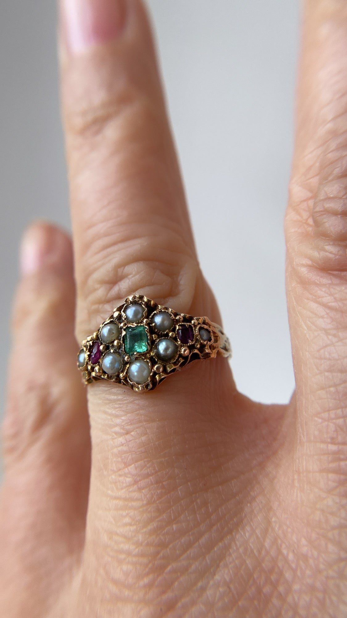 the ruby, pearl and emerald flower cluster