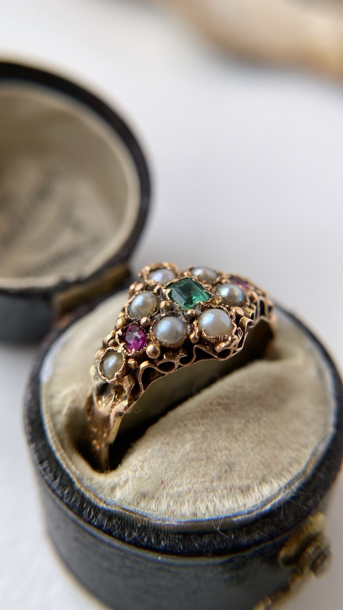 the ruby, pearl and emerald flower cluster