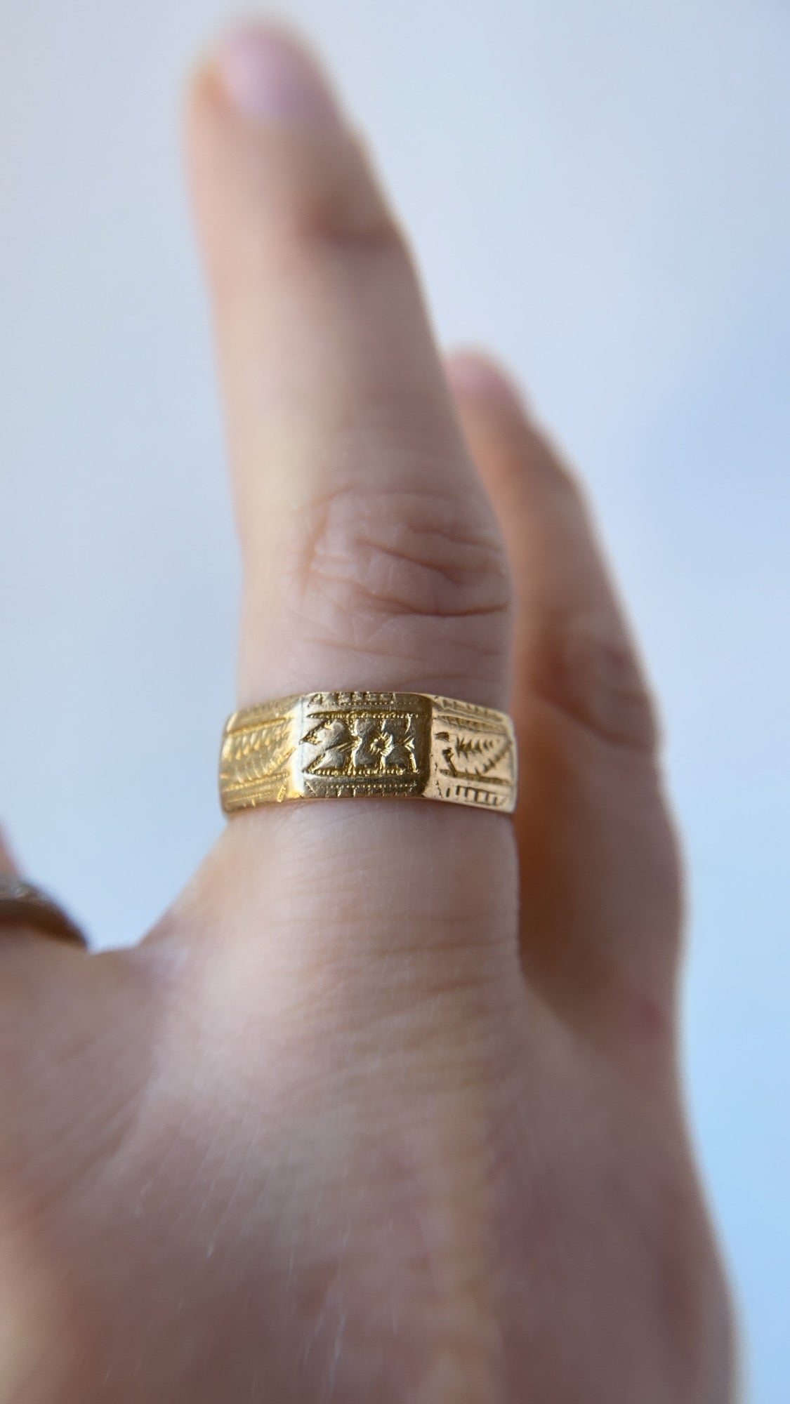 octagonal patterned gold wedding band