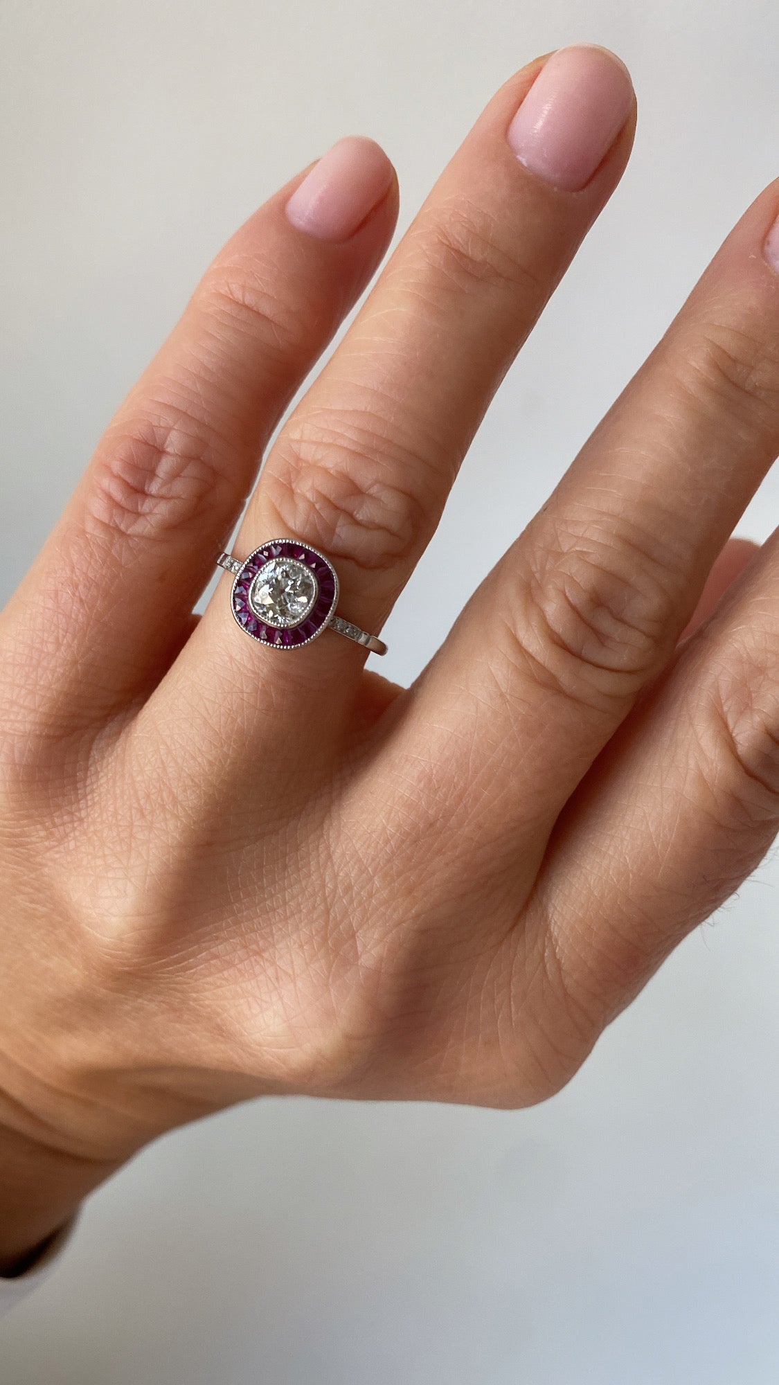 the art deco diamond and ruby target ring