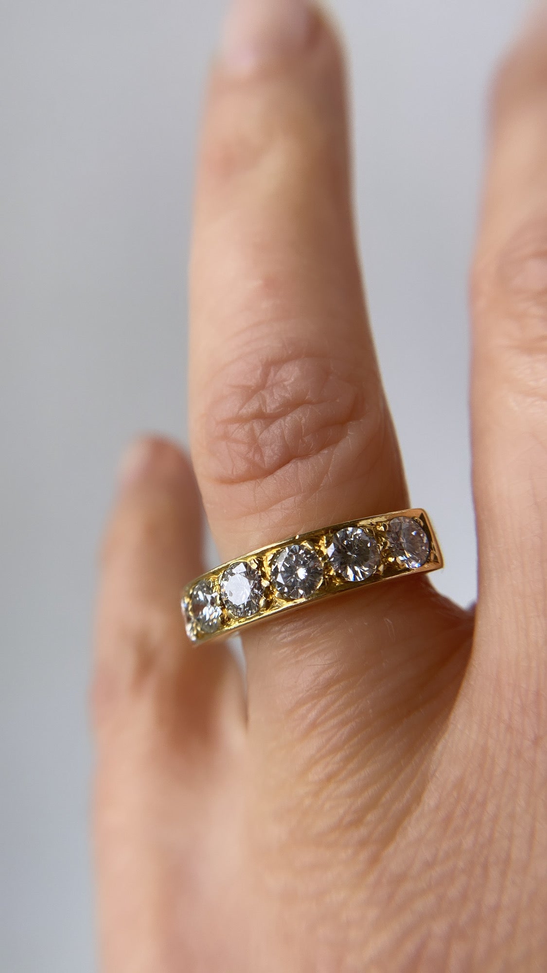 The diamond six stone gold band