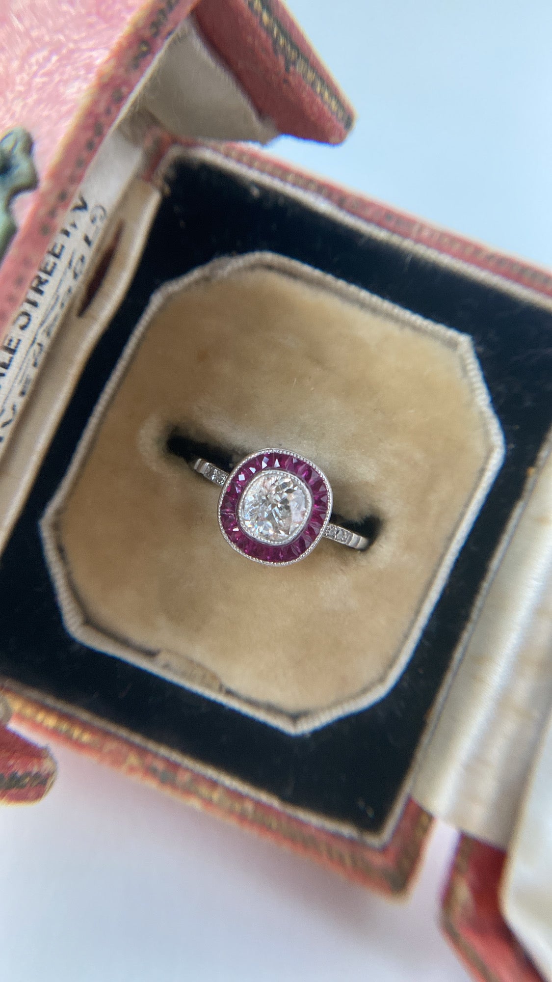 the art deco diamond and ruby target ring