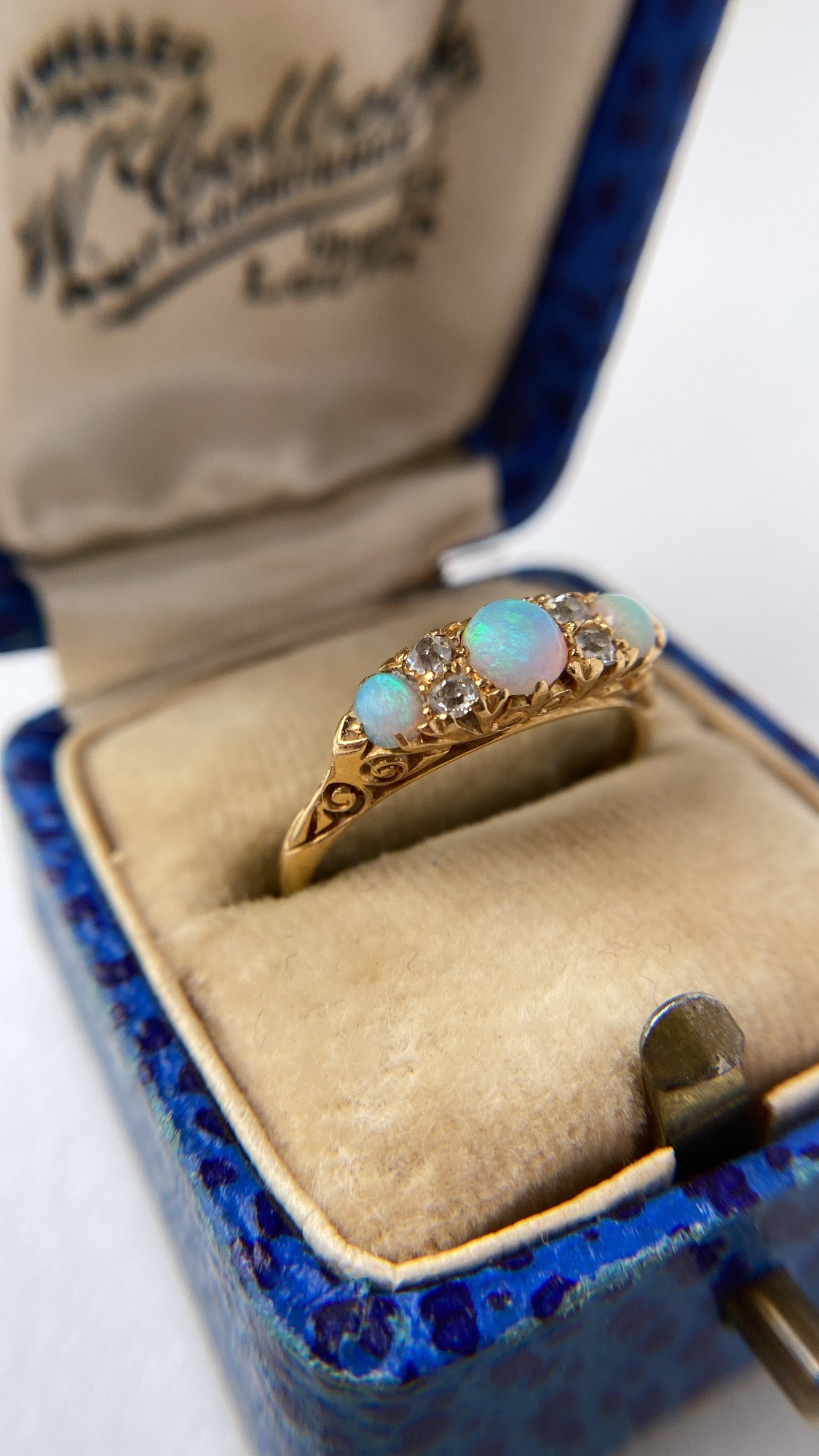 antique rainbow opal and diamond ring