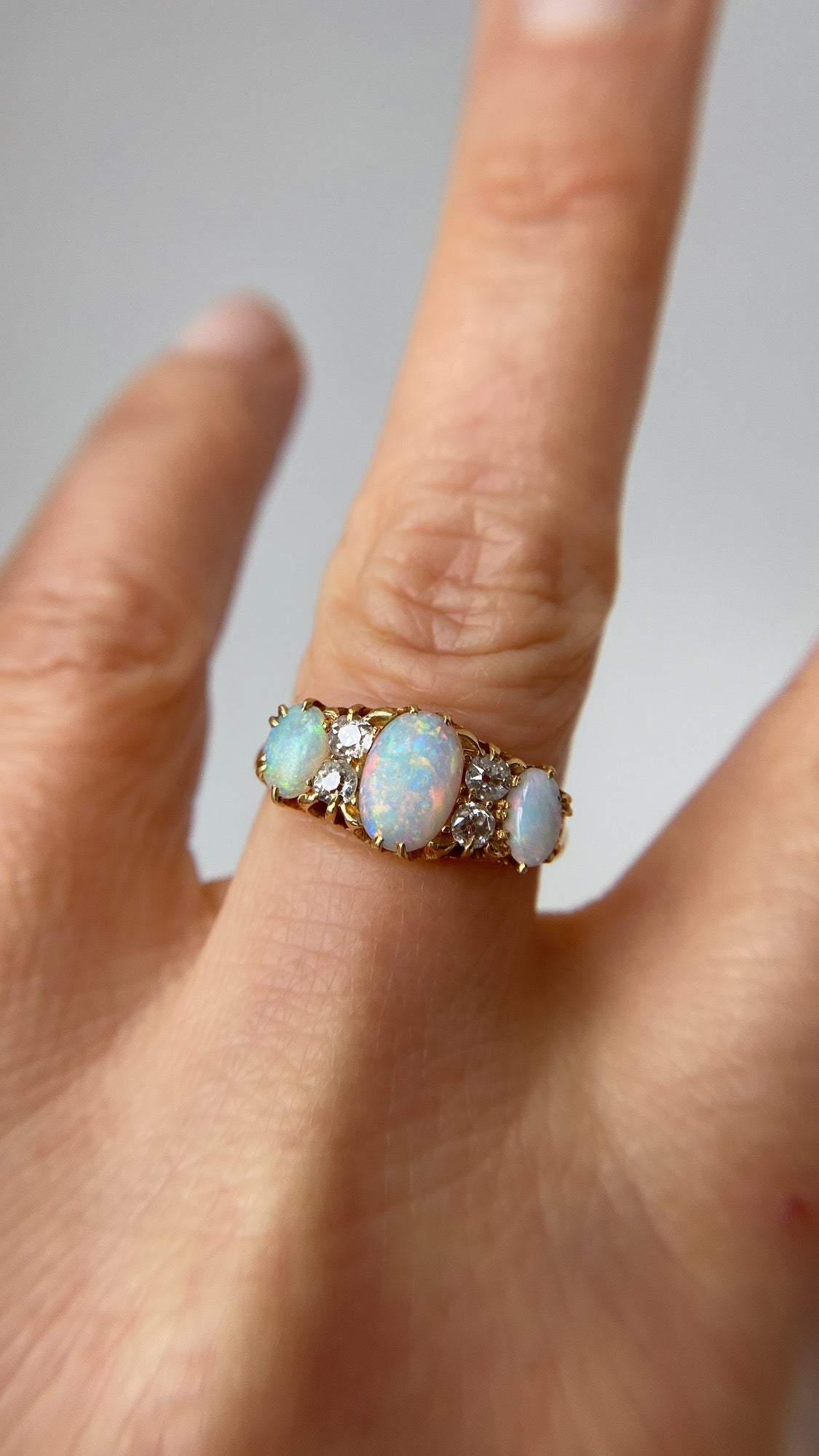 the rainbow opal and diamond ring