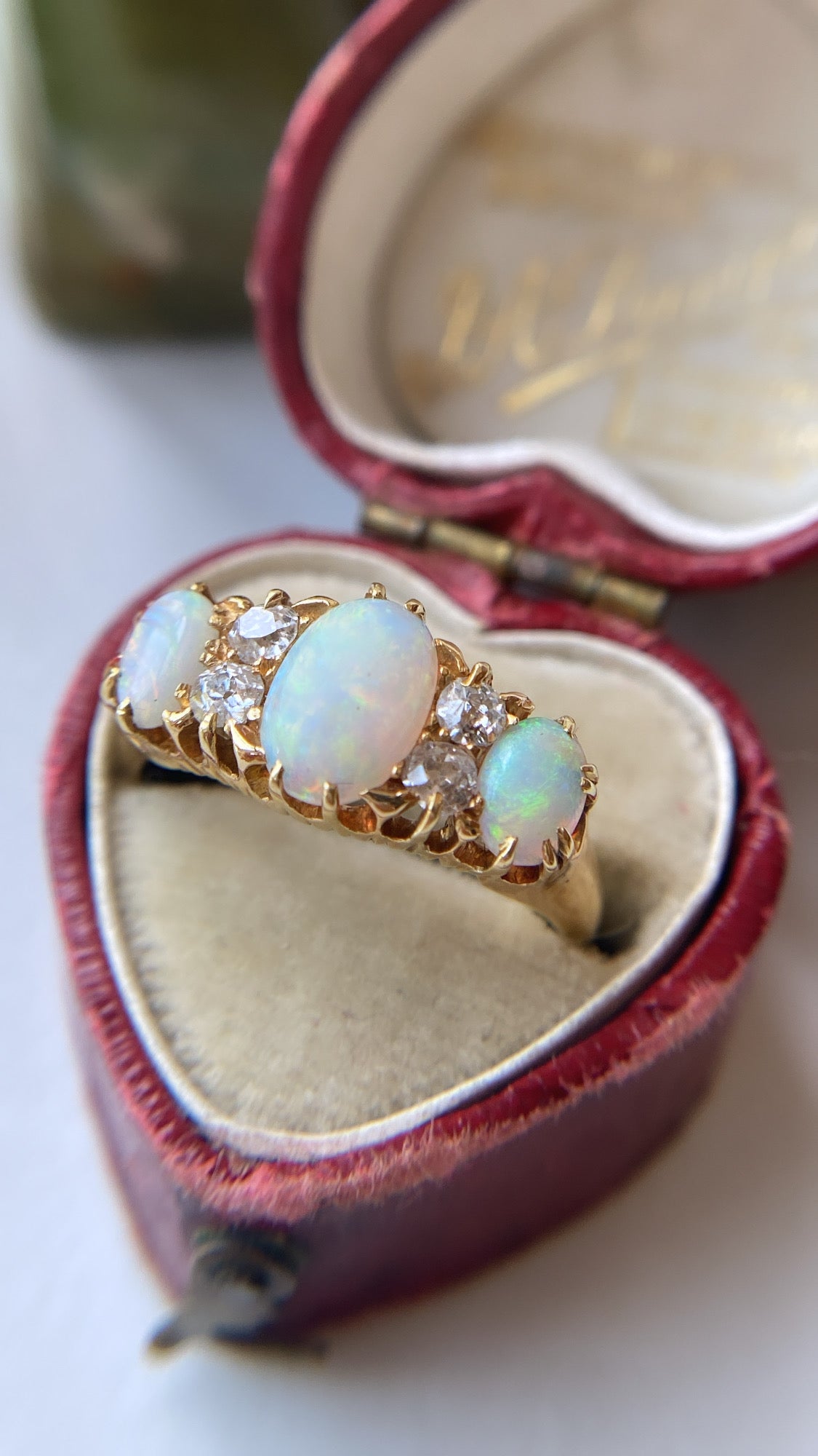antique rainbow opal and diamond ring