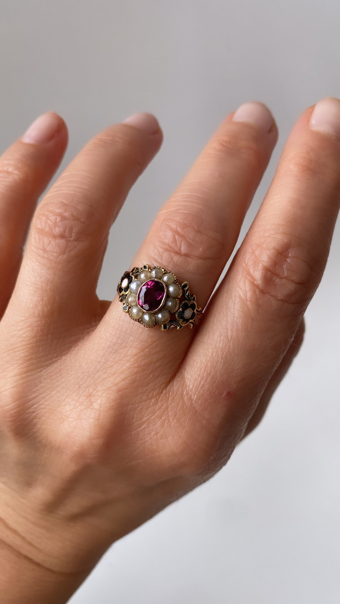 the enamel flower and garnet mourning ring