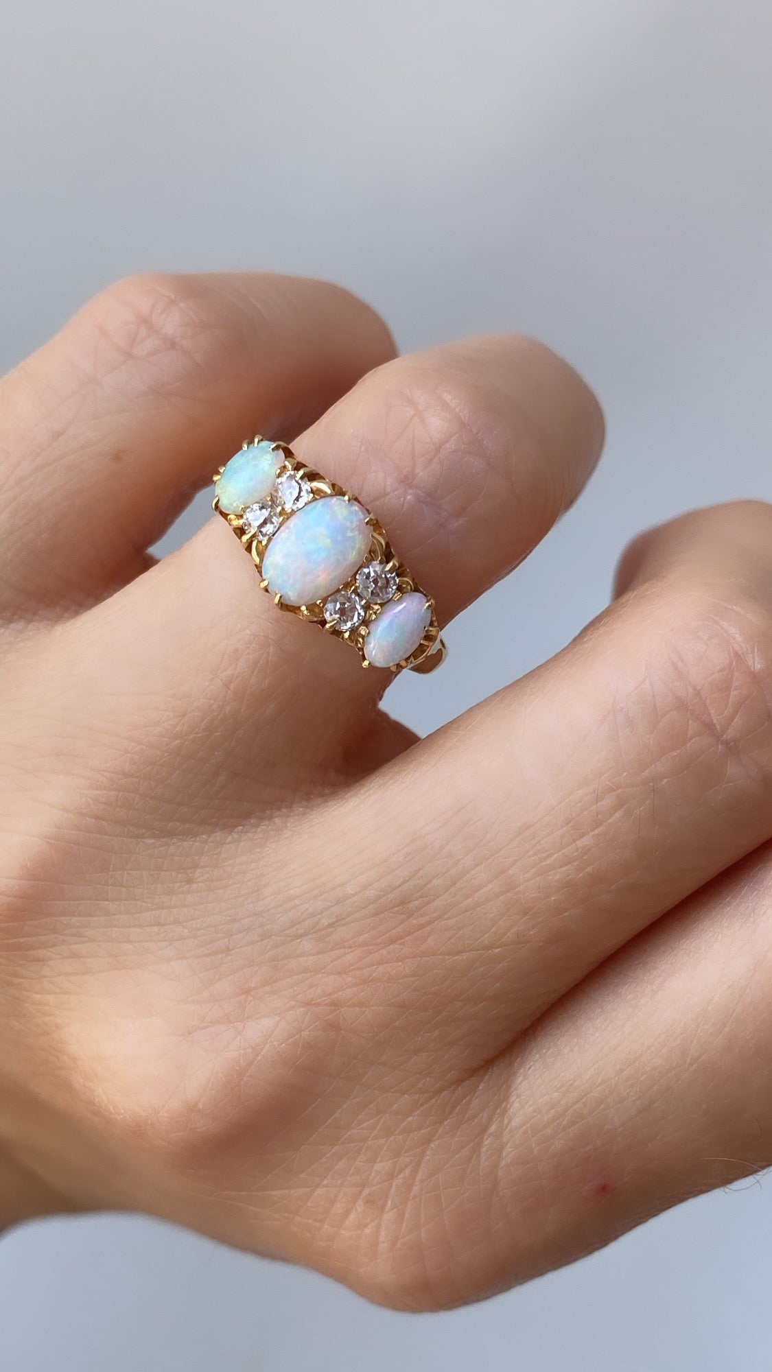 antique rainbow opal and diamond ring