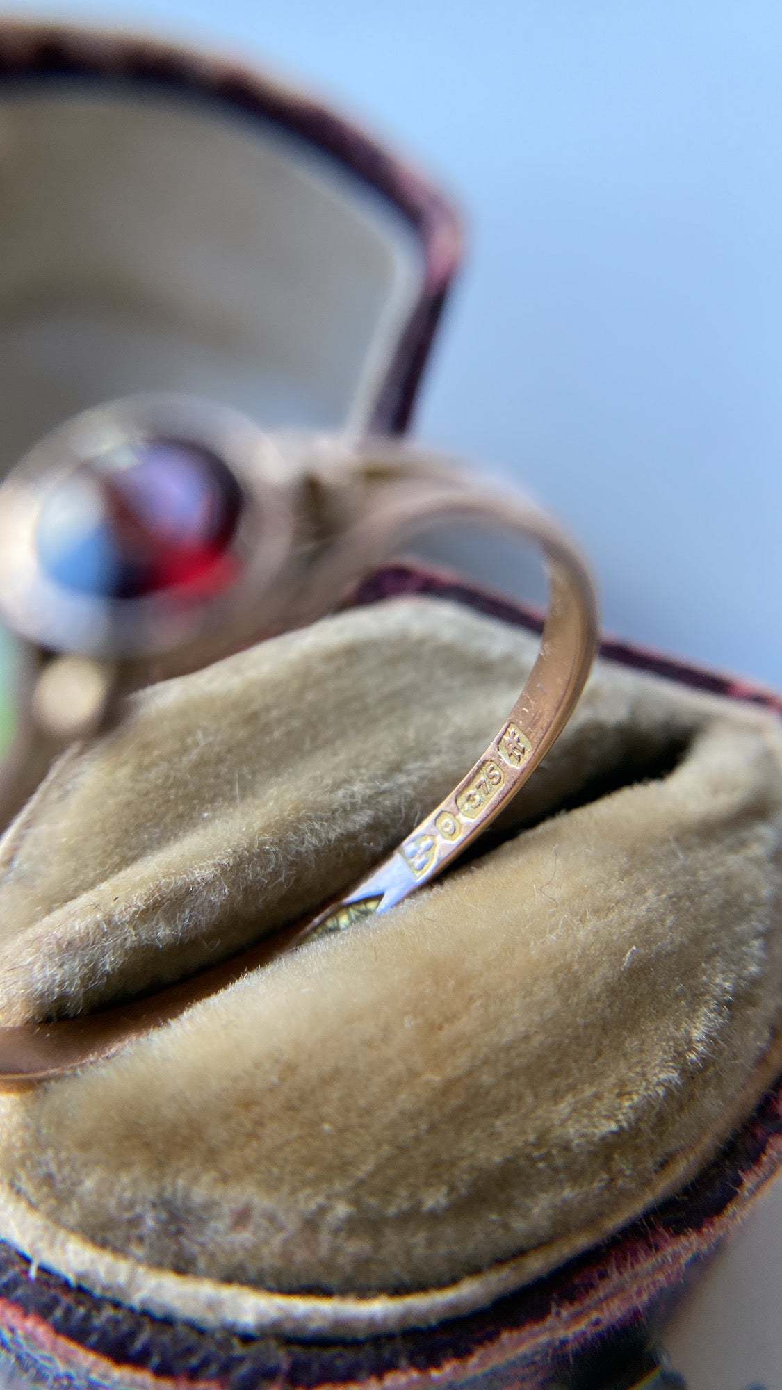 the opal and garnet three stone