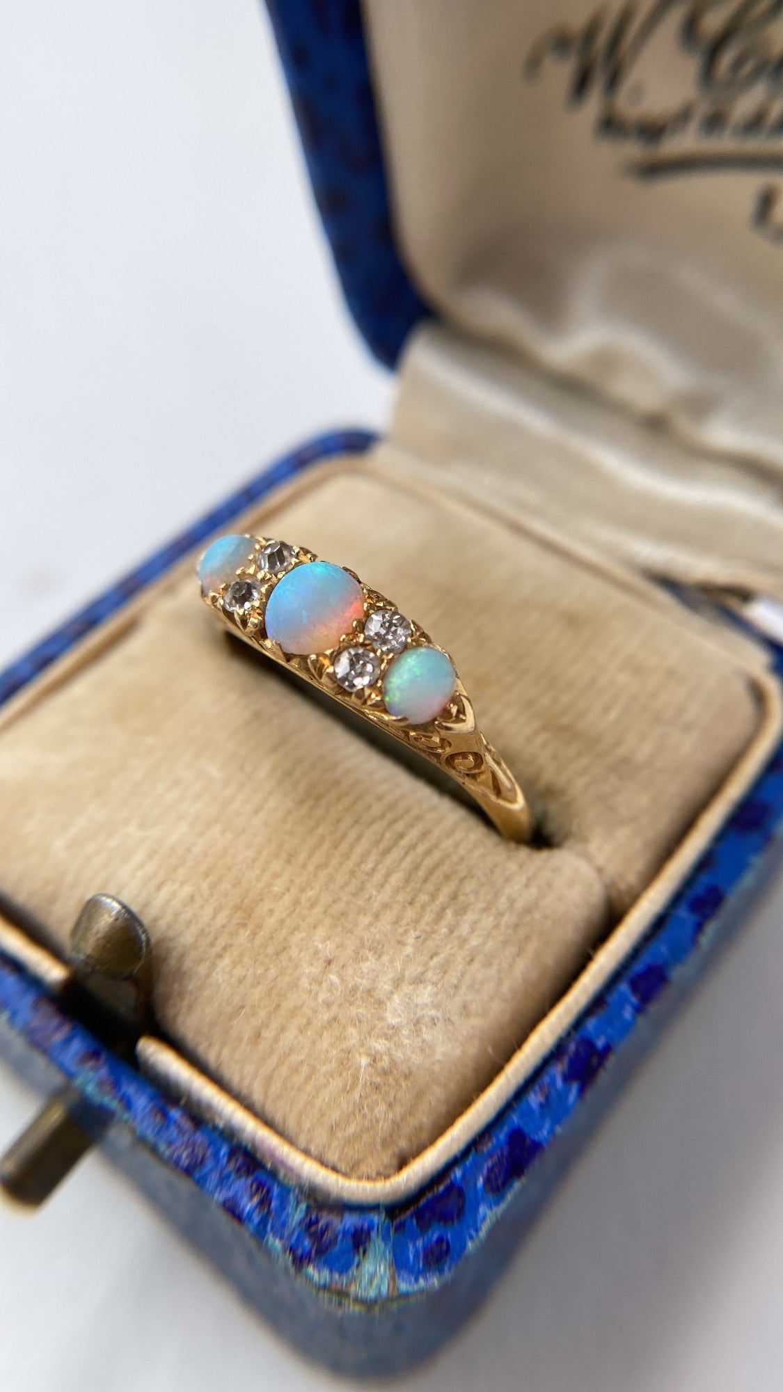 antique rainbow opal and diamond ring