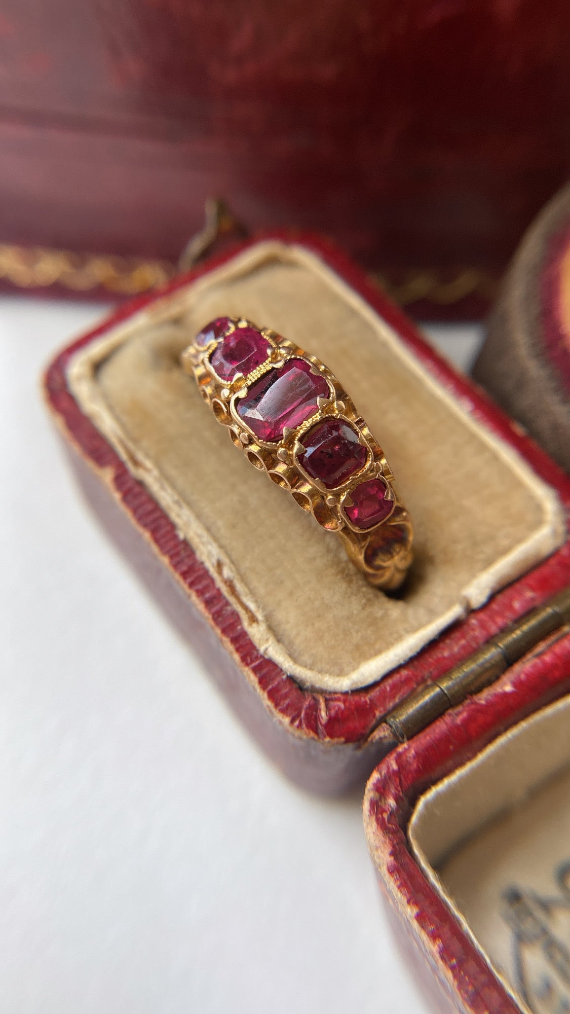 the antique garnet half hoop