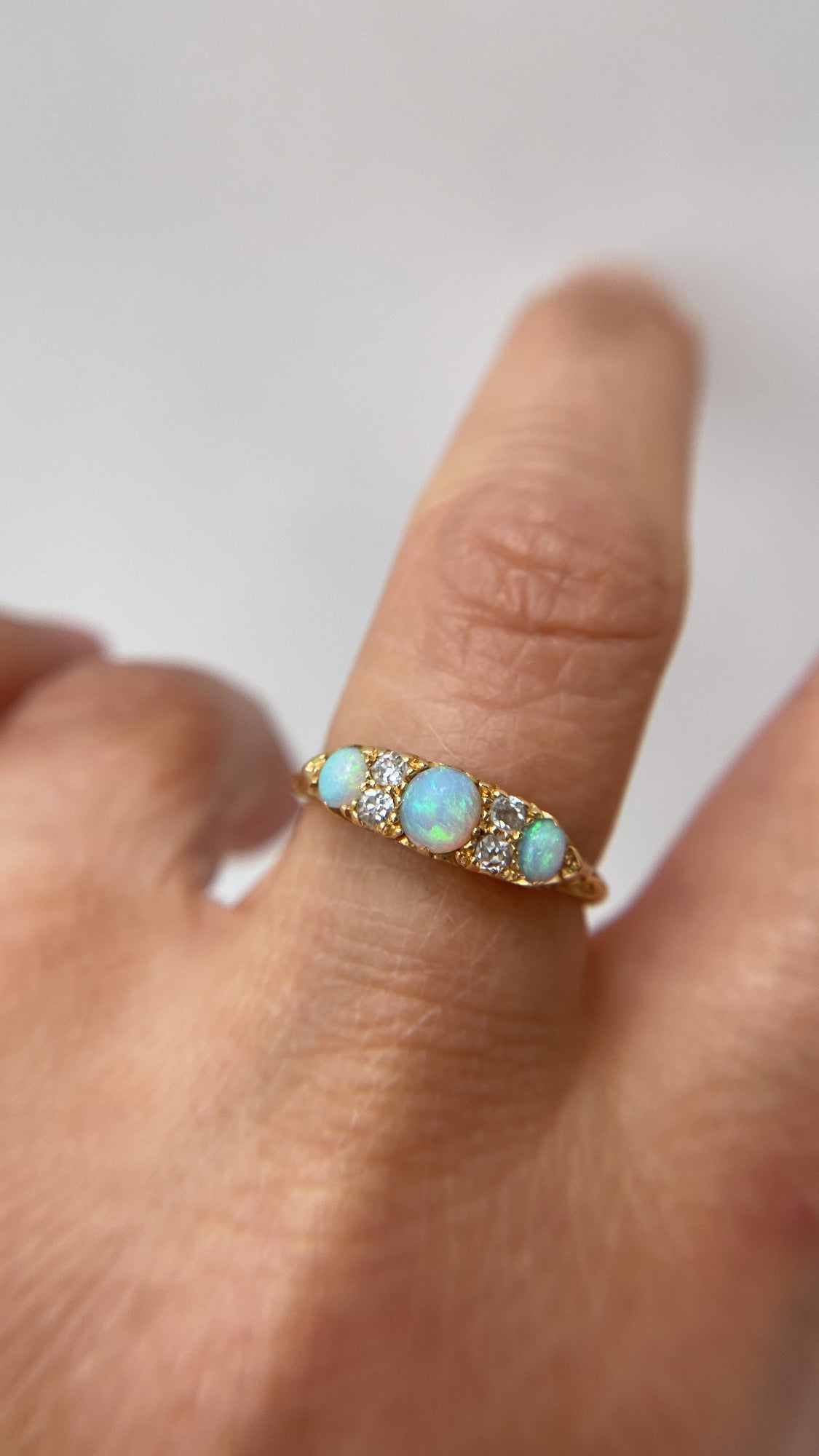 antique rainbow opal and diamond ring
