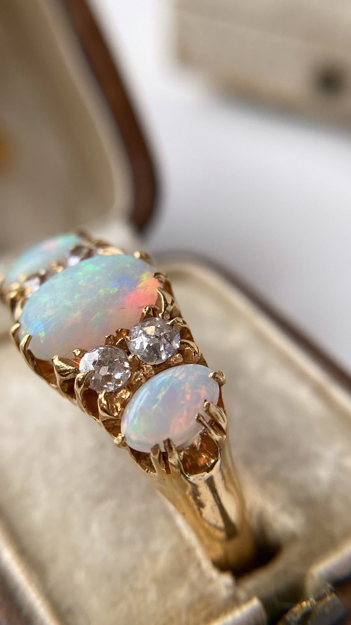 the rainbow opal and diamond ring