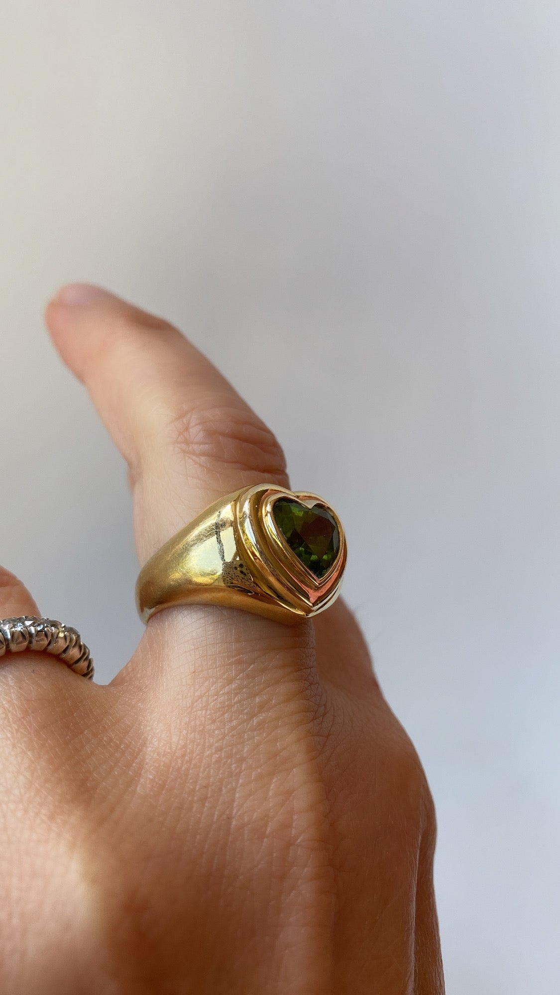 the peridot heart ring