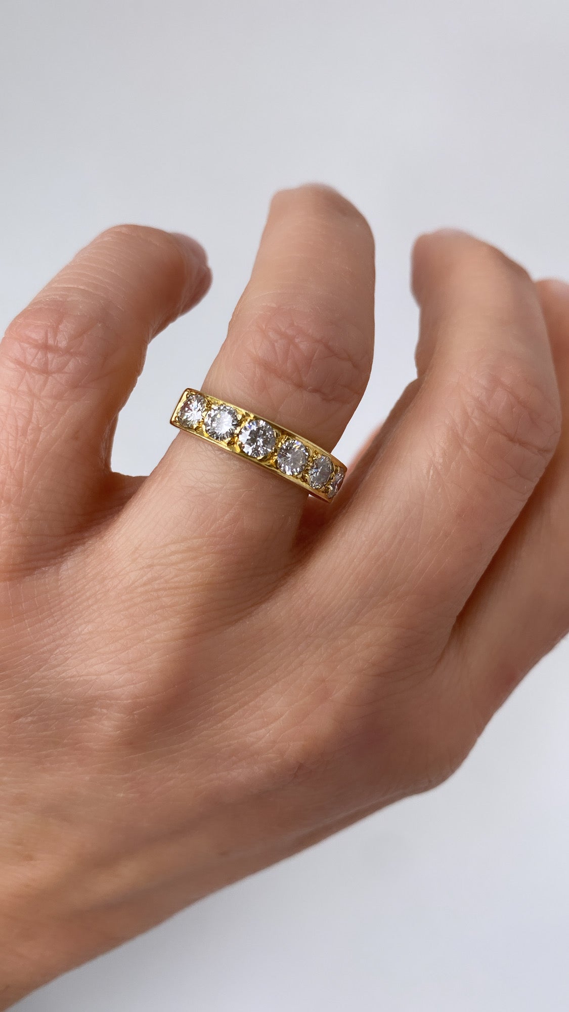 The diamond six stone gold band
