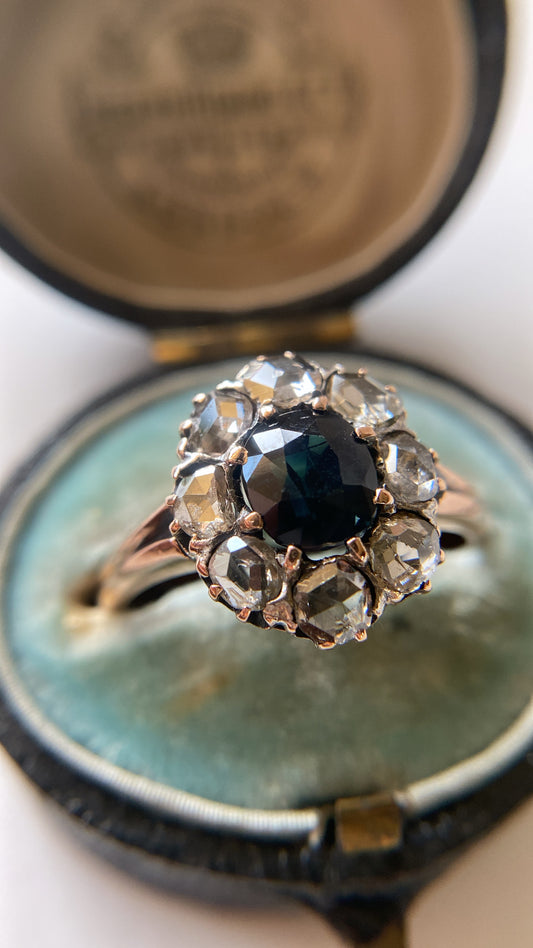 the teal green sapphire and rosecut diamond cluster