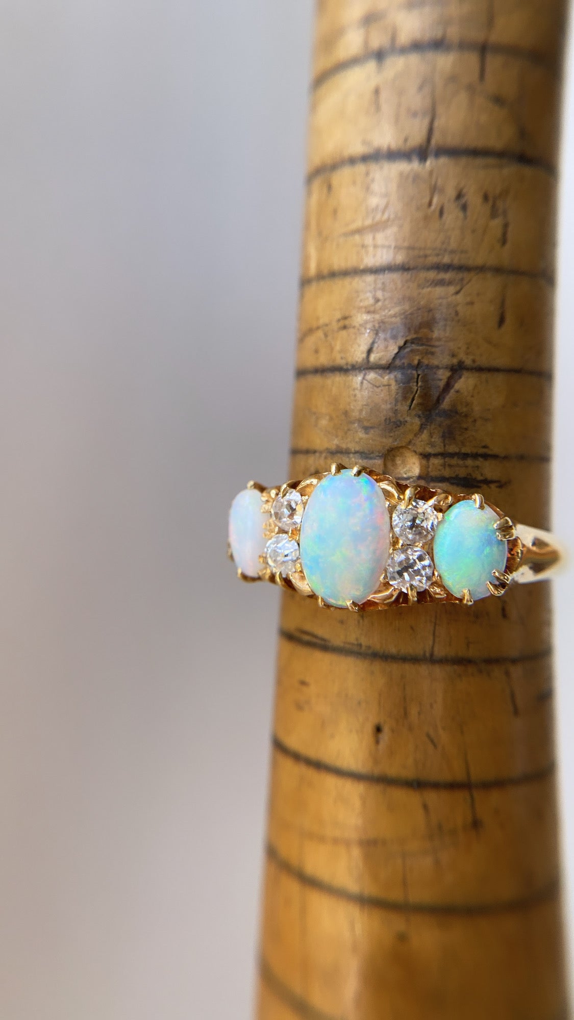 antique rainbow opal and diamond ring