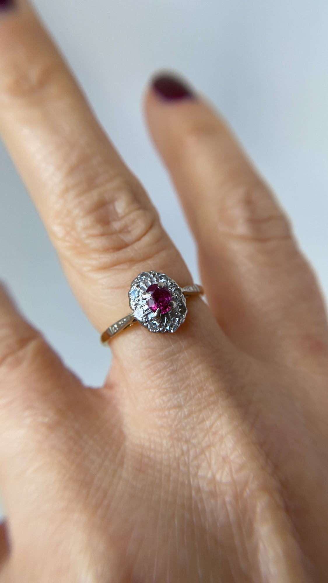 the sweet ruby and diamond halo ring