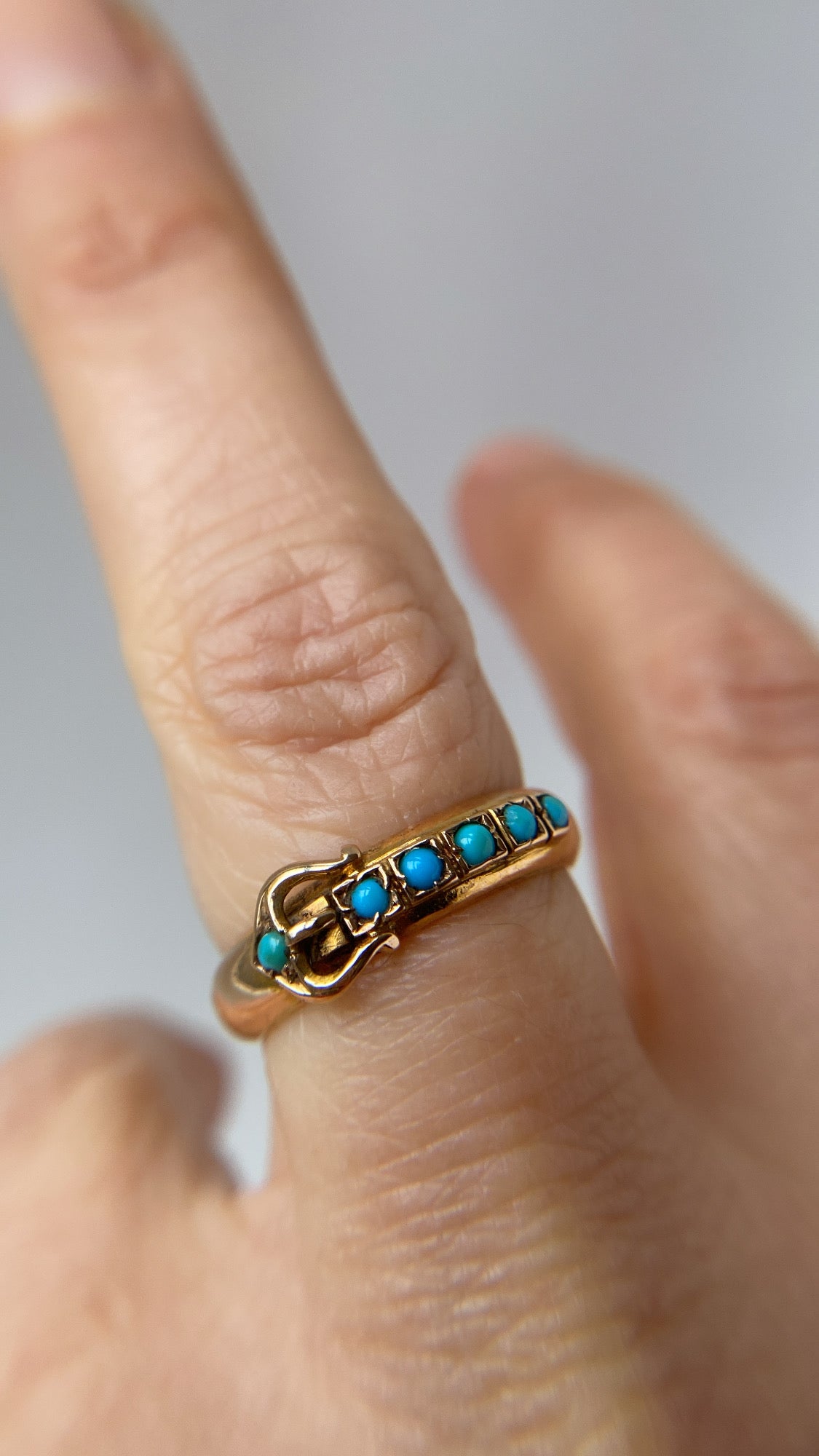 the antique turquoise buckle ring