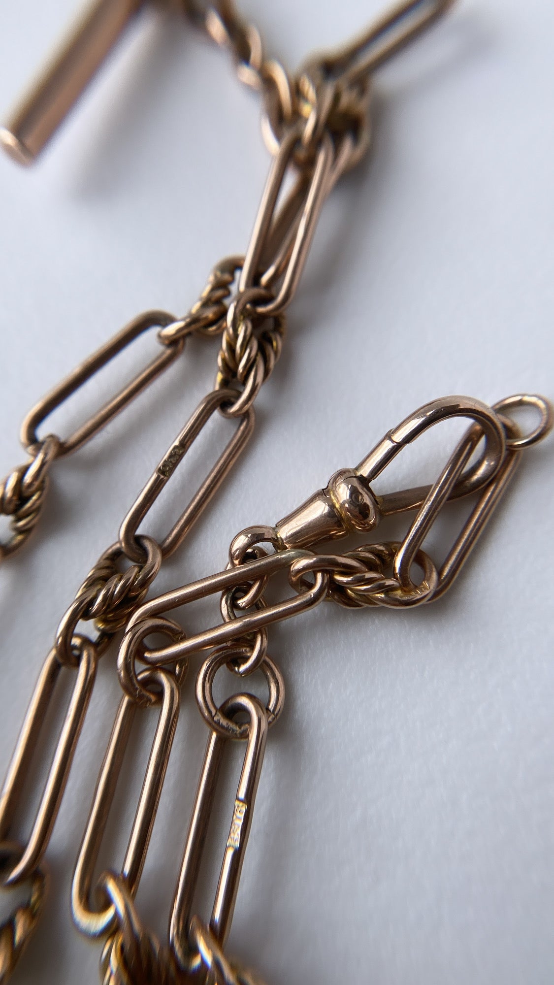 antique fancy link knot and trombone chain