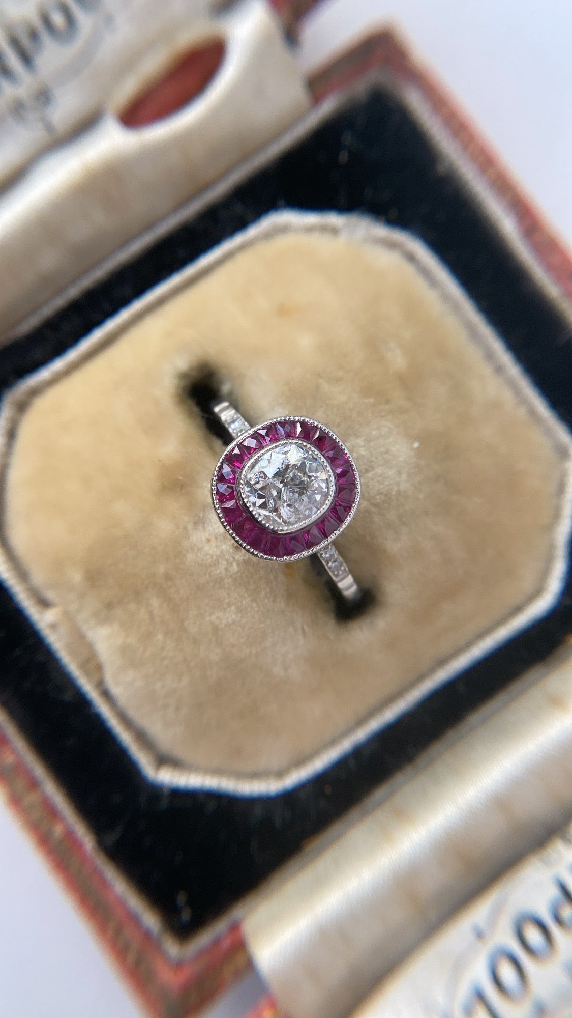 the art deco diamond and ruby target ring