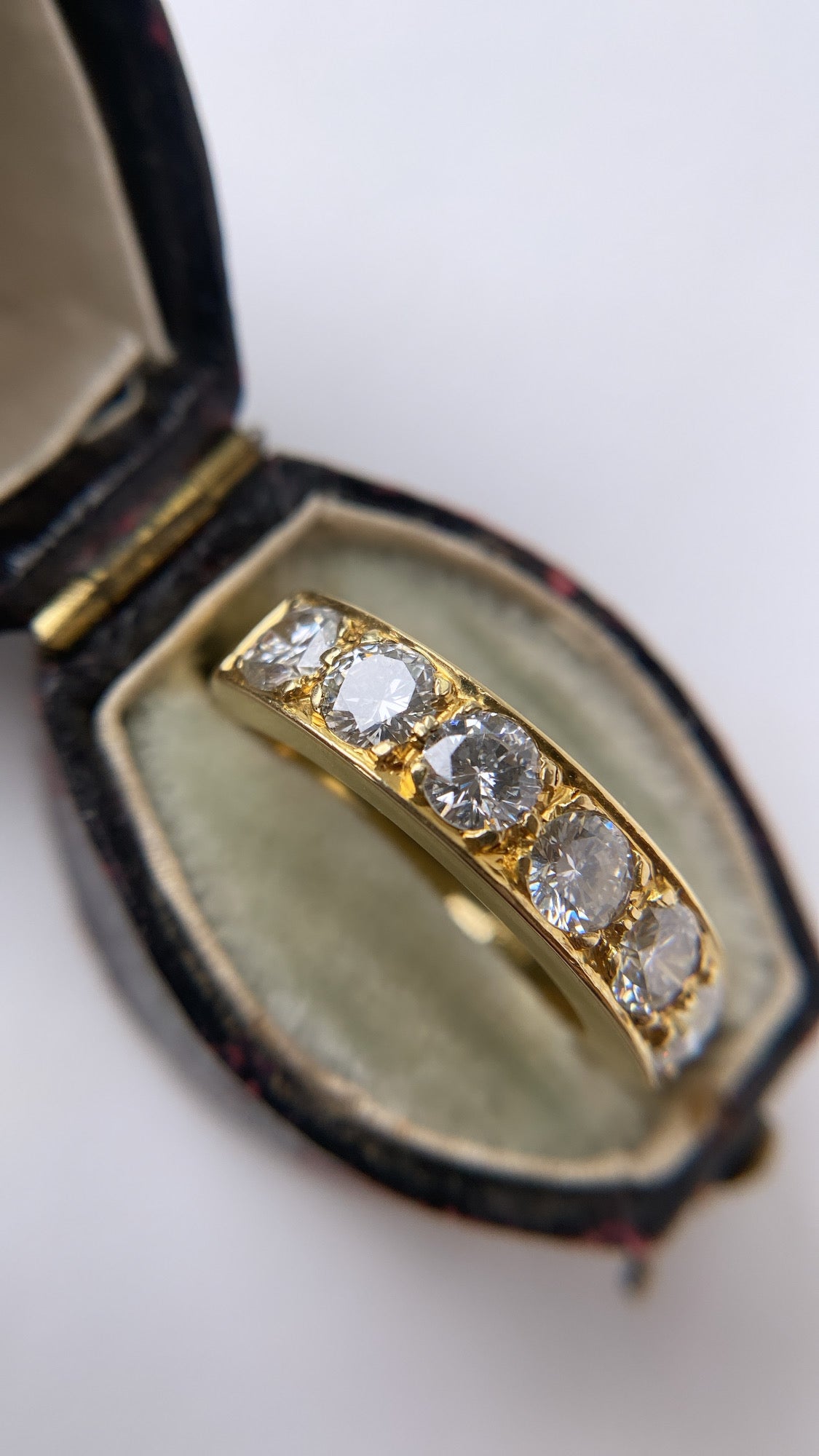 The diamond six stone gold band