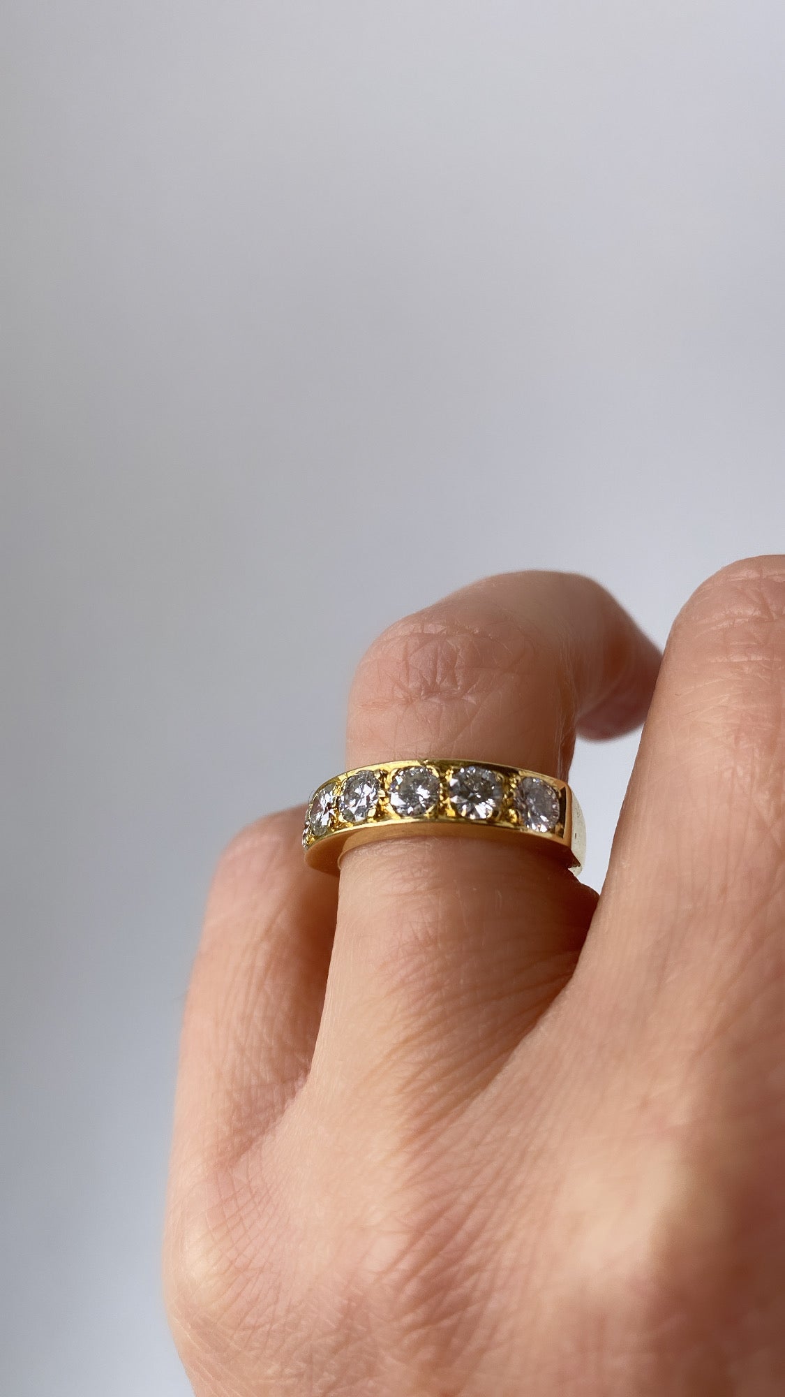 The diamond six stone gold band
