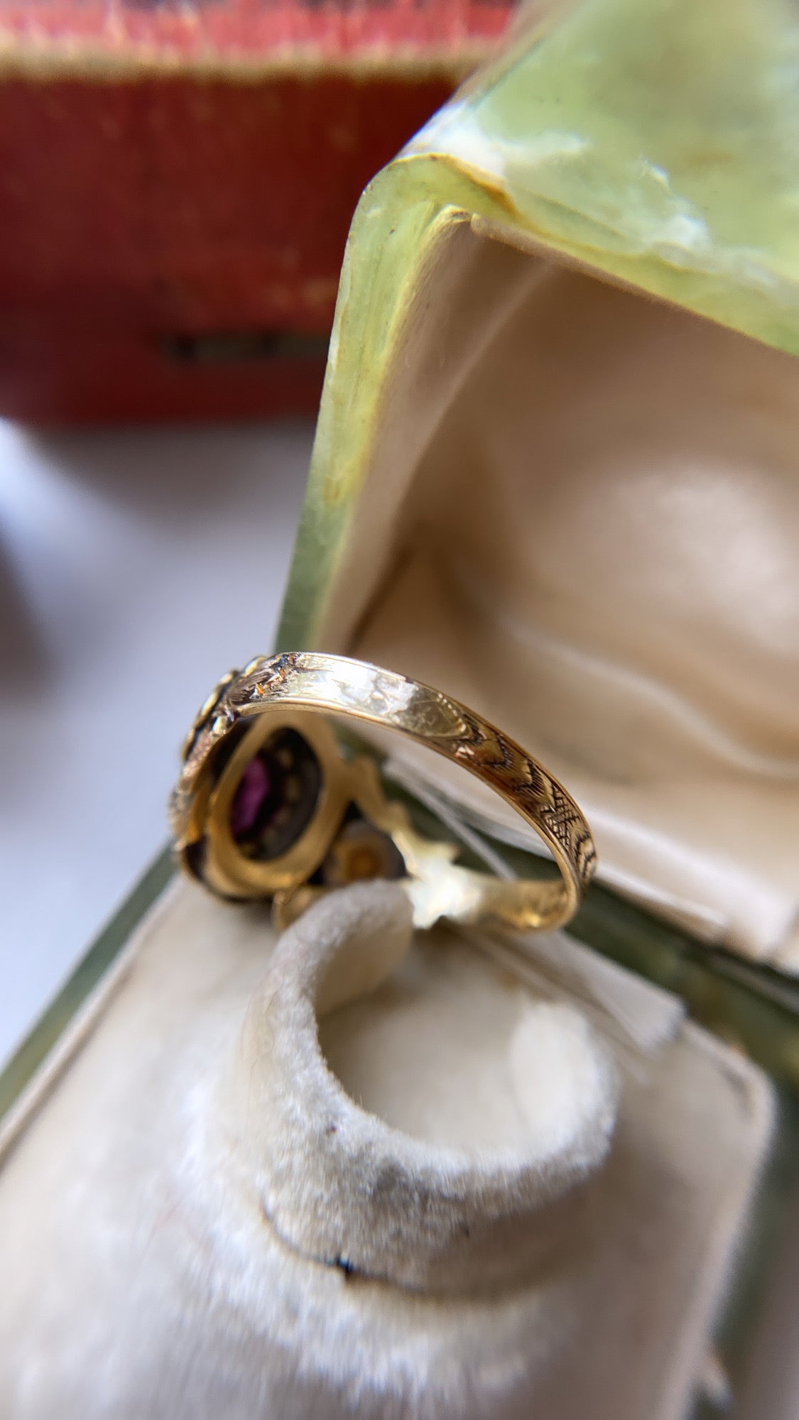 the enamel flower and garnet mourning ring