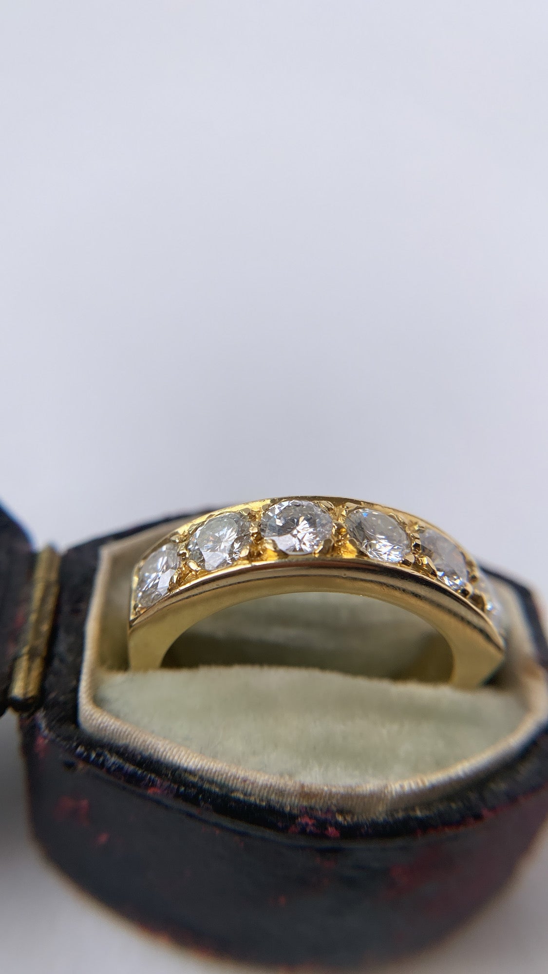 The diamond six stone gold band
