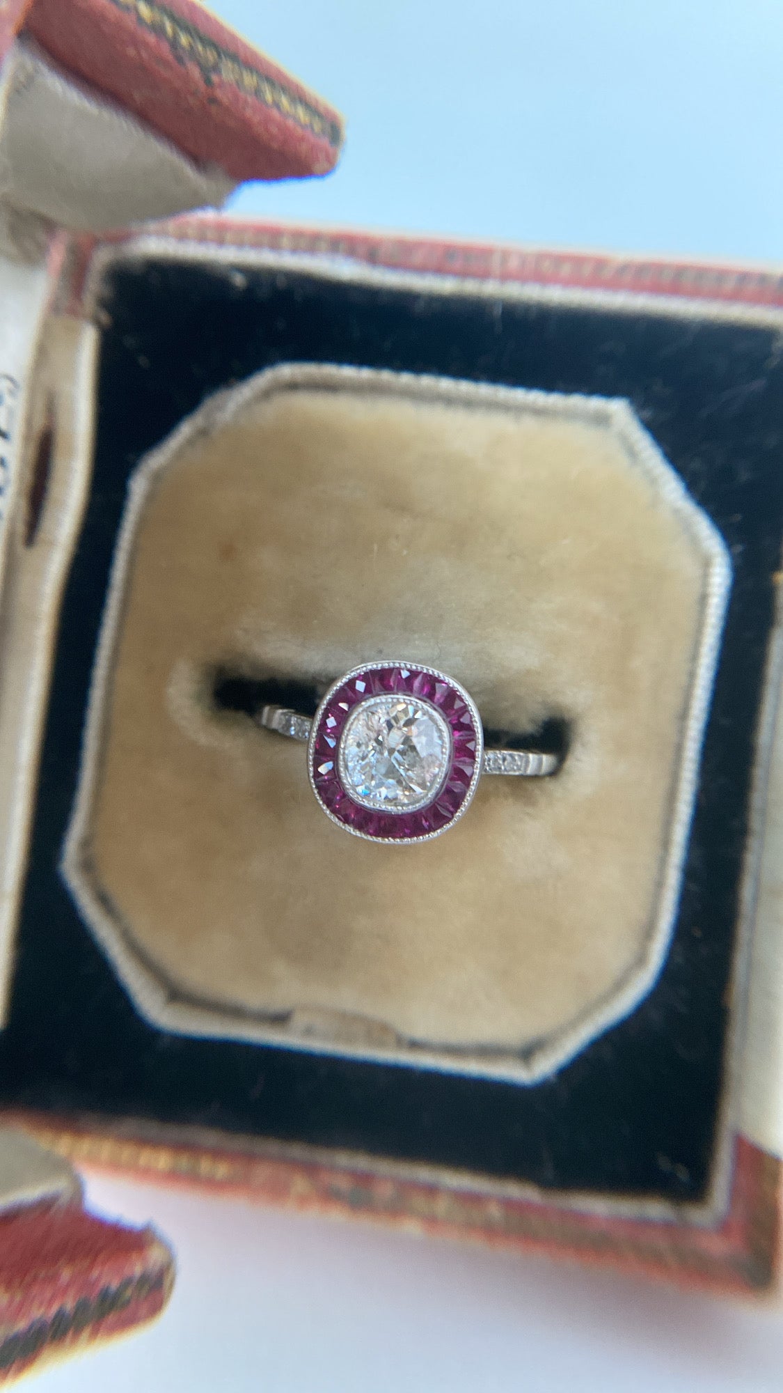 the art deco diamond and ruby target ring