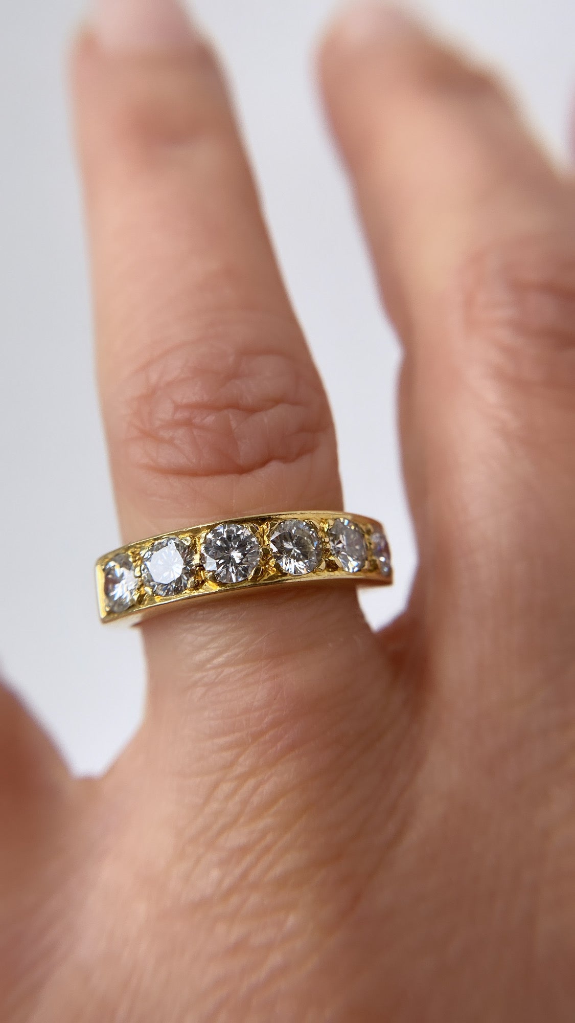 The diamond six stone gold band