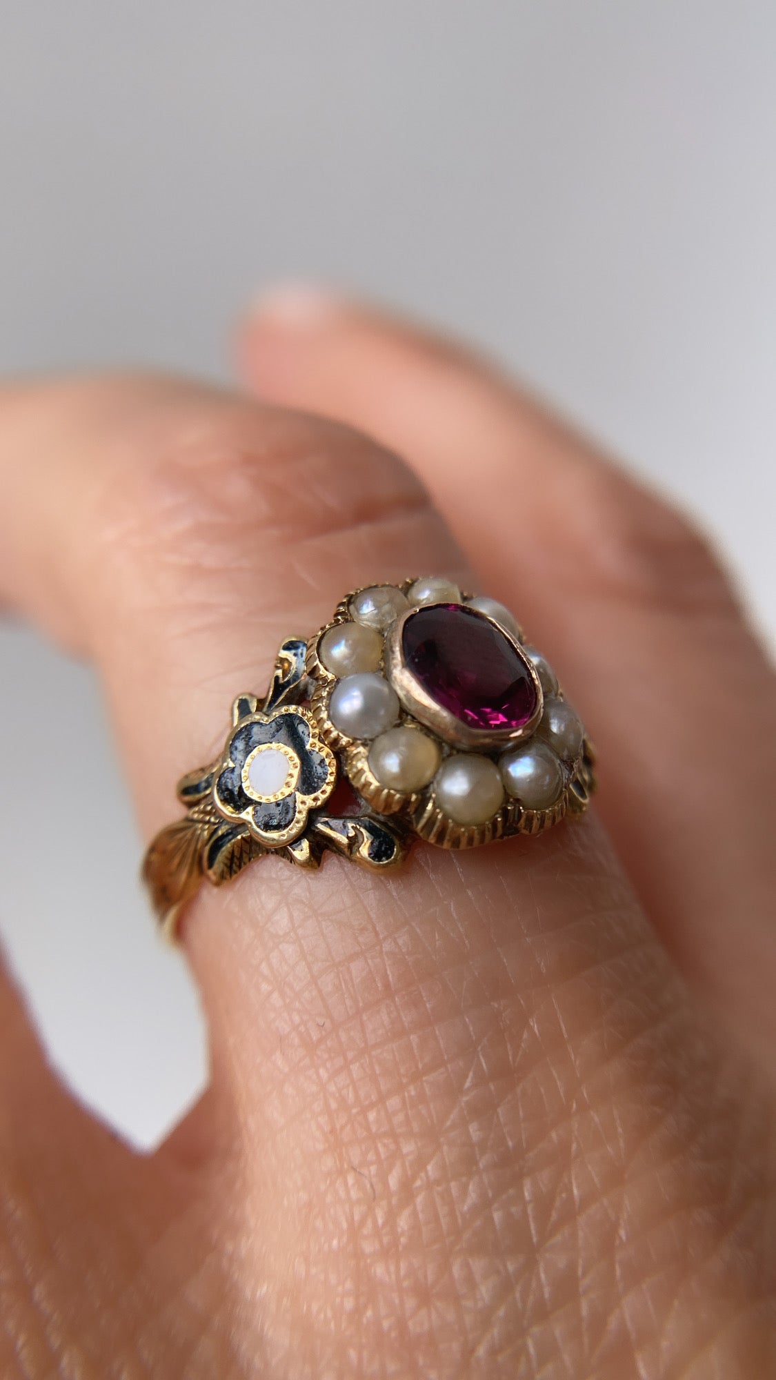 the enamel flower and garnet mourning ring