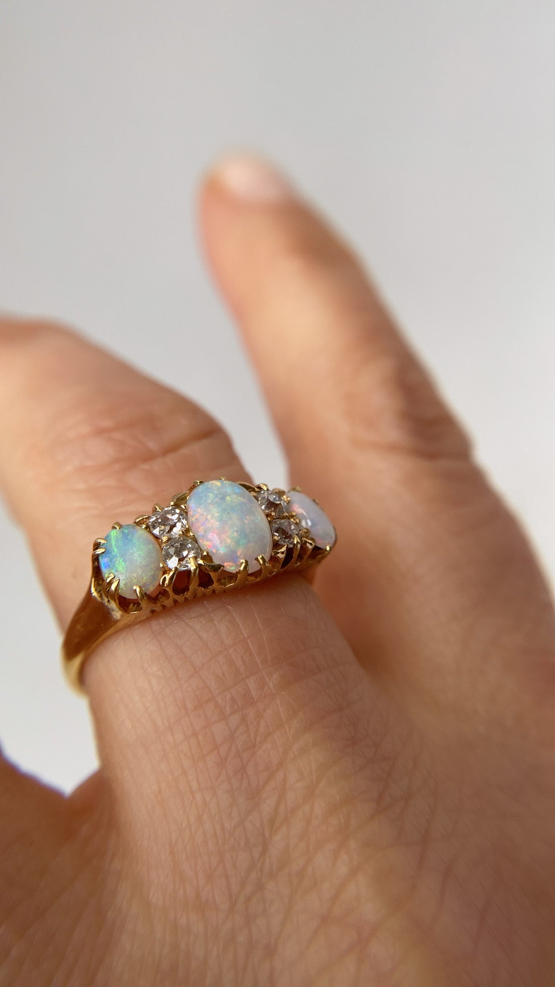 the rainbow opal and diamond ring