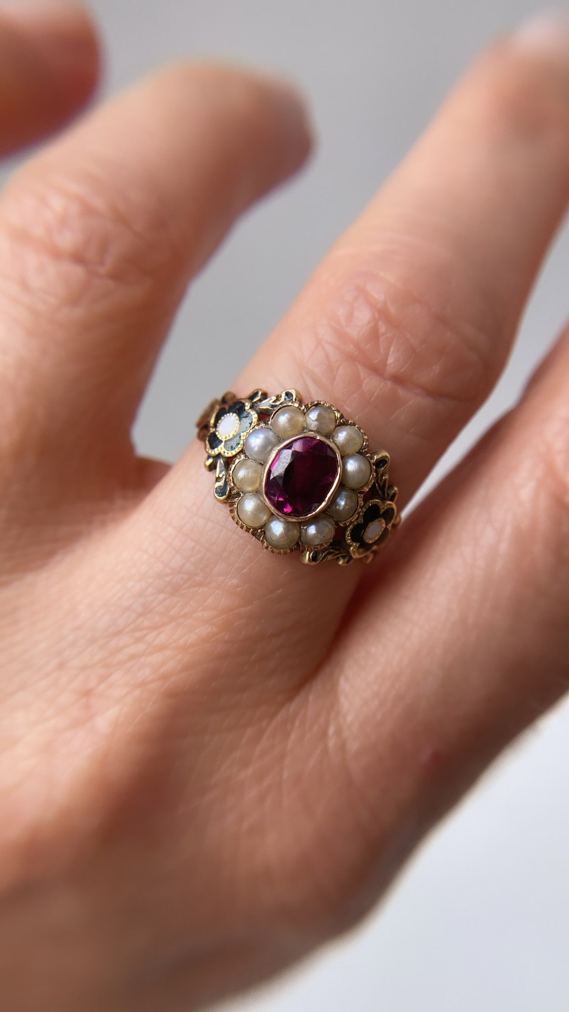the enamel flower and garnet mourning ring