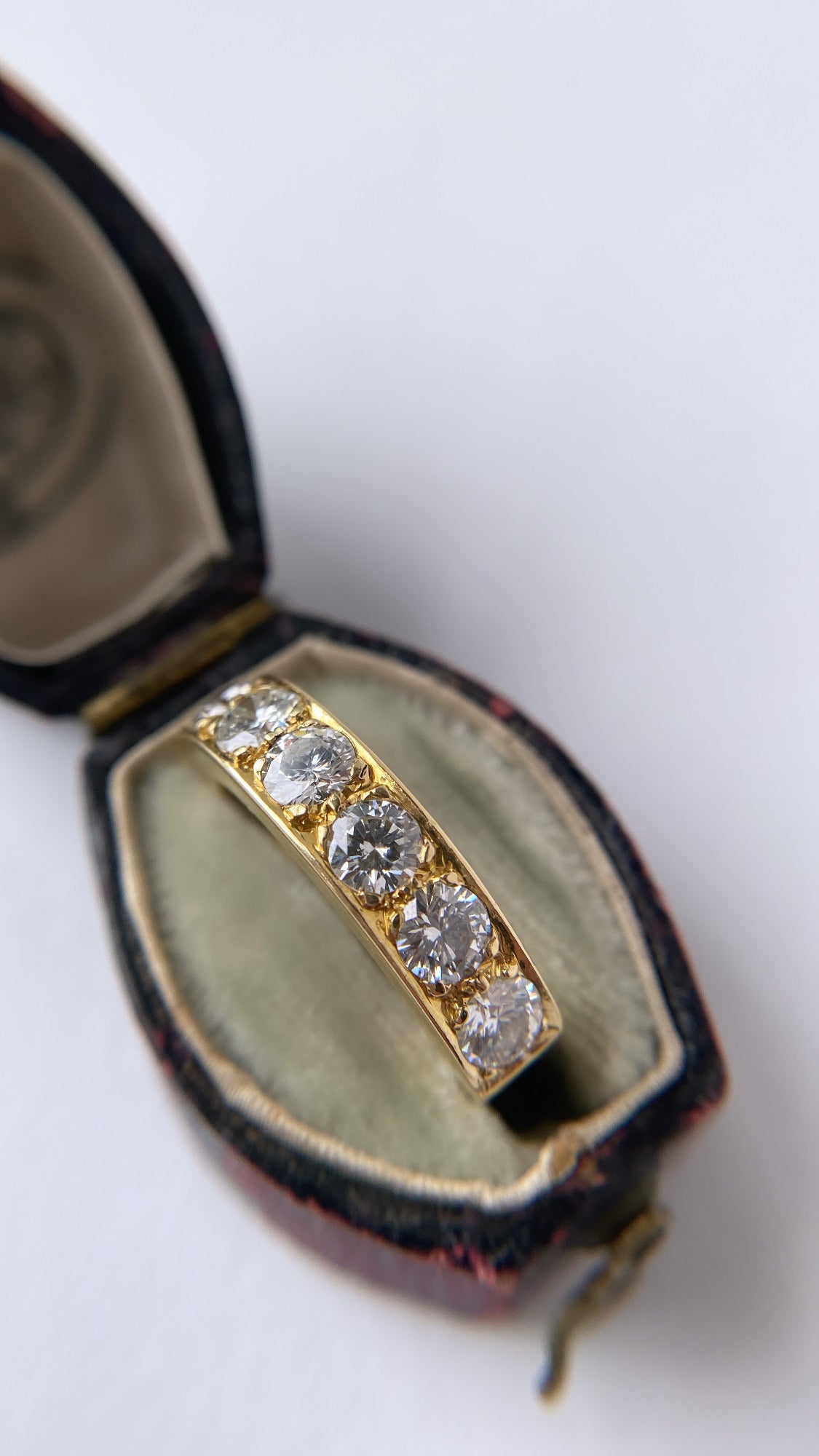 The diamond six stone gold band