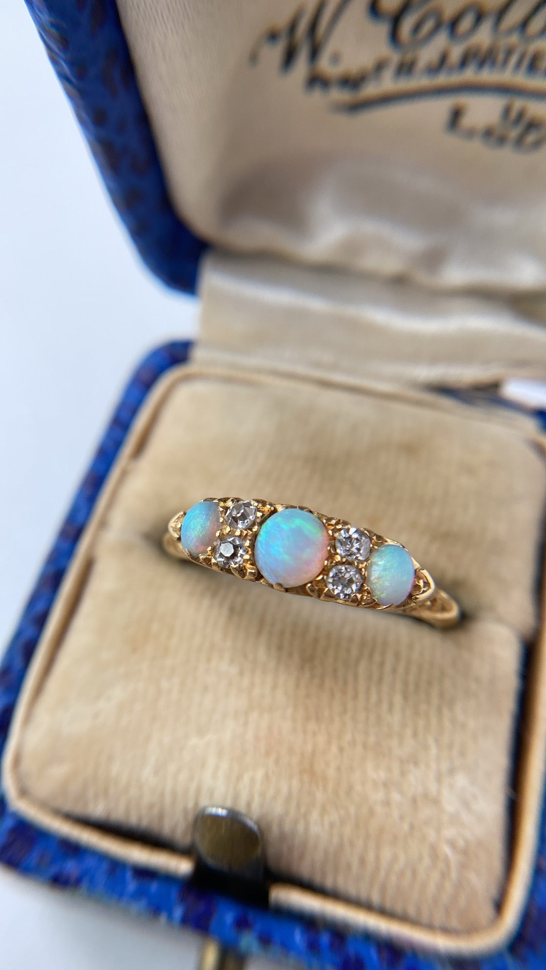 antique rainbow opal and diamond ring