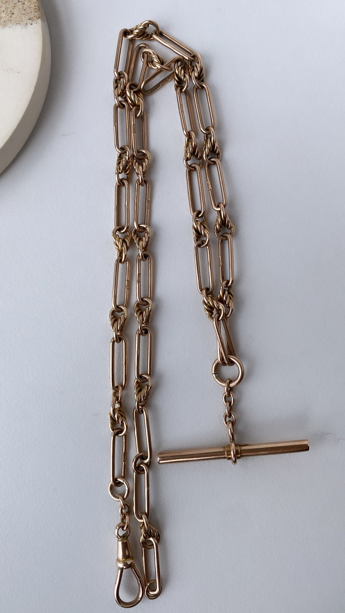 antique fancy link knot and trombone chain