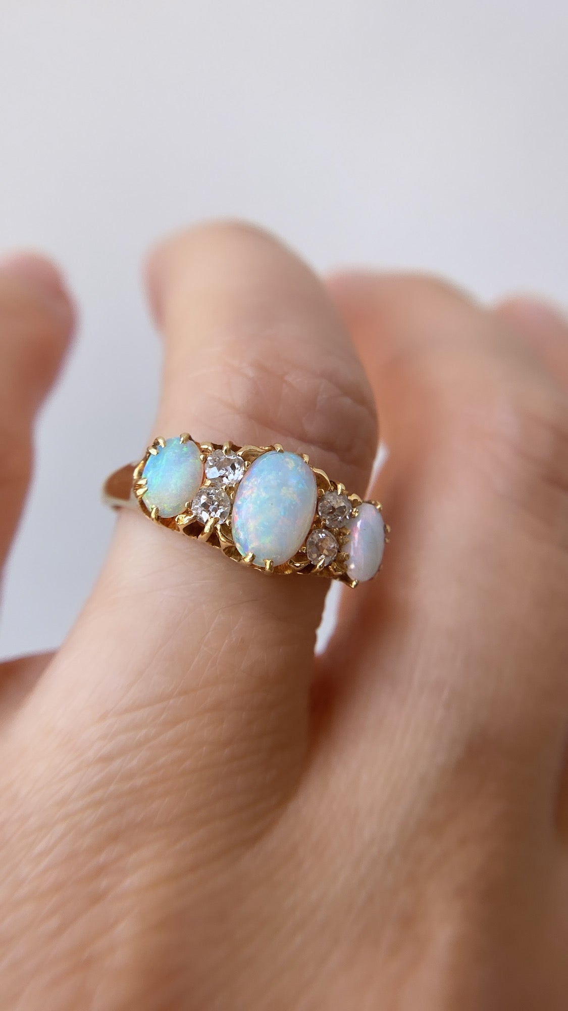 antique rainbow opal and diamond ring
